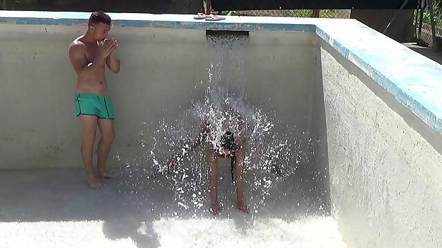 Two Brothers Play Naked With Water In Valencia Pool