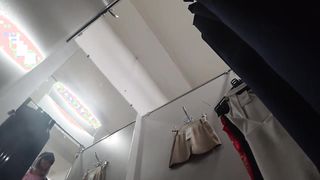 Peeping In A Public Fitting Room. Juicy Ass In Panties And Long Legs Fell Into The Lens Of A Hidden Camera. Fetish