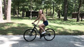 Madison Riding A Bike And Jumping Rope Topless