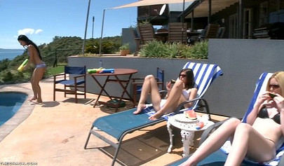 Sexy Babes Are Having Fun With A Water Guns By The Pool