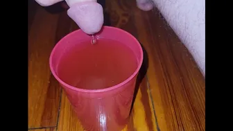 Teen Fills Cup With Piss