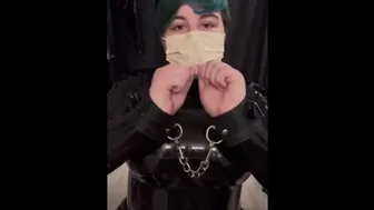 Girl Cuffs Her Self In A Latex Catsuit