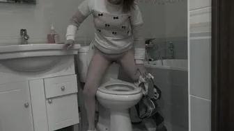 A Milf With A Hairy Pussy Pees While Standing