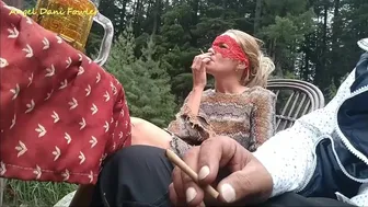 Angel Fowler Smoking And Drinking Next To Lake