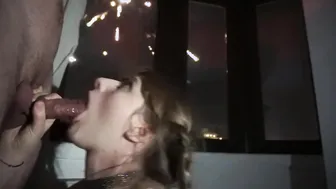 A Young Woman With Pigtails Sucks A Dick Near The Window Under New Year's Fireworks