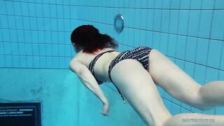 Redheaded Katrin Stripping Underwater