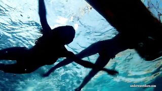 Mia And Petra Undress Eachother In The Swimmingpool