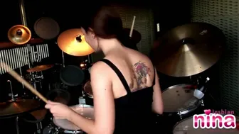 Lesbian Nina Drummer Showcasing Tits And Pussy