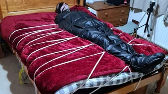 Man In Sleepsack Tormented By Woman 1-Bbw Domination,Bbw Bondage,Man In Bondage,Male Bondage,Man Tied Up,Leather Sleepsack,Sleep Sack,Amateur, Bound And Gagged Man,Bed Bound