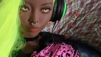 Ebony Skinned Sex Doll Masturbates With A Joypad